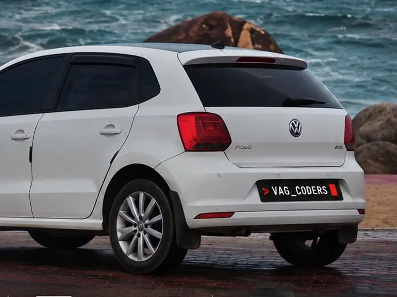 White VW Polo 2015 by the sea in Kanyakumari